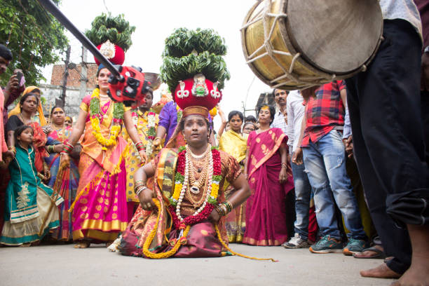 A Devotee performs for Bonalu or Goddess Mahankali is a Hindu Festival, celebrated in Hyderabad, India on 7 Jul 2018 – 28 Jul 2018, These 21 days is called Ashada Masam, of July/August every year